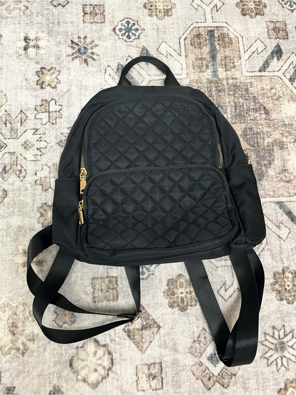 black quilted nylon backpack